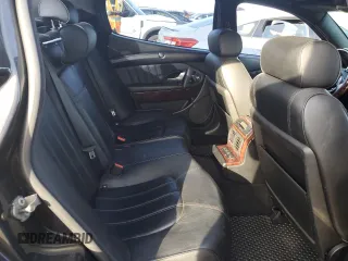 2009 Maserati Quattroporte z VIN ZAMJK39A290046644, wystawiony jako Copart lot #77969144 z przebiegiem 87 355 mil mil oraz Czysty tytuł • Clean title. Historia ofert i sprzedaży dostępna na DreamBid. Obrazek 10.