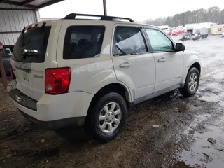 2008 Mazda Tribute ES with VIN 4F2CZ06148KM13459, listed as a IAAI auction lot 41742402 with 196,030 mi miles and . Bid and sale history available at DreamBid. Image 4.