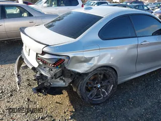 2015 BMW 2 Series 228i with VIN WBA1F5C55FV343662, listed as a IAAI auction lot 41729309 with 90,770 mi miles. Bid and sale history available at carsss.com. Image 6.