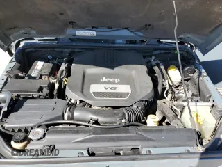 2015 Jeep Wrangler Unlimited Sahara with VIN 1C4BJWEGXFL624846, listed as a Copart auction lot 47949535 with 125,710 mi miles and Salvage Title. Bid and sale history available at carsss.com. Image 12.