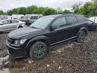 2018 Dodge Journey SE with VIN 3C4PDDAG0JT184673, listed as a Copart auction lot 58490745 with 141,749 mi miles and Salvage title. Bid and sale history available at DreamBid. Image 1.