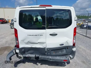 2017 Ford Transit Cargo z VIN 1FTYR2ZM2HKA21541, wystawiony jako IAAI lot #42540880 z przebiegiem 177 013 mil mil oraz . Historia ofert i sprzedaży dostępna na DreamBid. Obrazek 16.