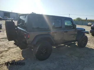2022 Jeep Wrangler Unlimited Willys with VIN 1C4HJXDG1NW102069, listed as a Copart auction lot 52353995 with 33,328 mi miles and Salvage Title. Bid and sale history available at DreamBid. Image 3.