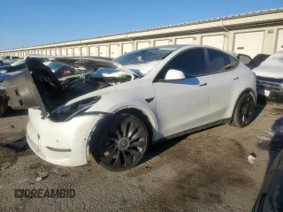 2022 Tesla Model Y Performance with VIN 7SAYGDEFXNF381791, listed as a Copart auction lot 88215705 with 60,153 mi miles and Salvage title. Bid and sale history available at DreamBid. Image 1.