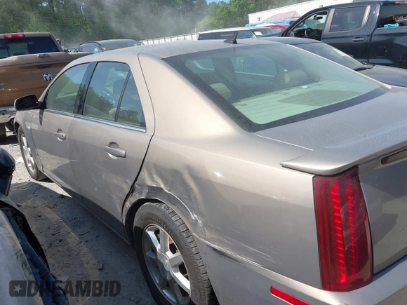 2007 Cadillac STS z VIN 1G6DW677X70117510, wystawiony jako IAAI lot #42061512 z przebiegiem 187 798 mil mil oraz . Historia ofert i sprzedaży dostępna na DreamBid. Obrazek 14.