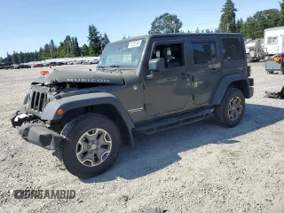 2015 Jeep Wrangler Unlimited Rubicon с VIN 1C4BJWFG1FL552174, выставлен на аукционе Copart как лот 61282795 с пробегом 111 757 миль миль и Списание • Salvage title. История ставок и продаж доступна на DreamBid. Изображение 1.