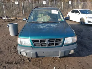 1999 Subaru Forester L with VIN JF1SF635XXH735202, listed as a IAAI auction lot 41489355 with 290,000 mi miles. Bid and sale history available at carsss.com. Image 12.