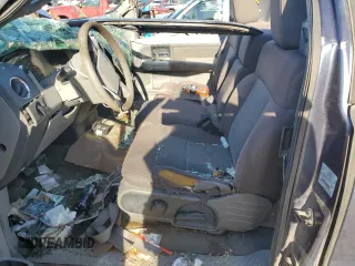 2004 Ford F-150 XL with VIN 1FTPX12534FA31237, listed as a Copart auction lot 58831324 with 301,271 mi miles and Non Repairable. Bid and sale history available at DreamBid. Image 7.