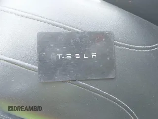 2022 Tesla Model 3 Long Range with VIN 5YJ3E1EB0NF106570, listed as a IAAI auction lot 41832622 with 52,679 mi miles and . Bid and sale history available at DreamBid. Image 11.