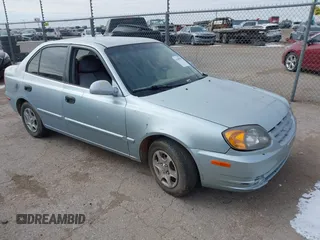 2005 Hyundai Accent GLS with VIN KMHCG45C65U576092, listed as a IAAI auction lot 41368504 with 162,208 mi miles. Bid and sale history available at carsss.com. Image 1.