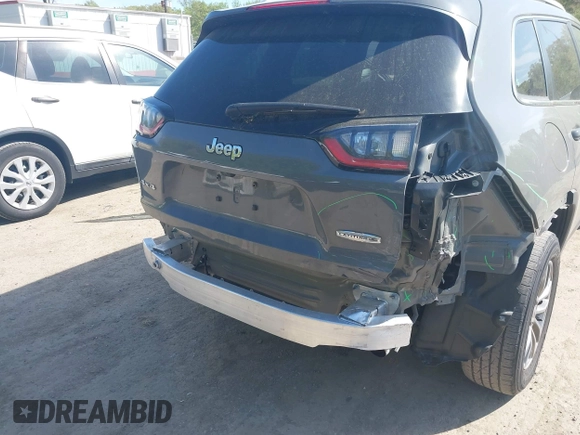 2020 Jeep Cherokee Altitude with VIN 1C4PJMLXXLD505262, listed as a IAAI auction lot 42075051 with 68,743 mi miles and . Bid and sale history available at DreamBid. Image 6.