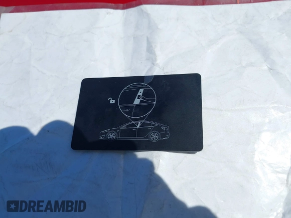 2018 Tesla Model 3 Long Range Battery z VIN 5YJ3E1EAXJF048839, wystawiony jako IAAI lot #42328412 z przebiegiem 83 083 mil mil oraz . Historia ofert i sprzedaży dostępna na DreamBid. Obrazek 11.