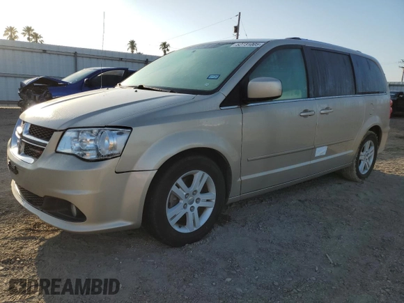 2013 Dodge Grand Caravan Crew with VIN 2C4RDGDG4DR567707, listed as a Copart auction lot 52731005 with 210,359 mi miles and Salvage Title. Bid and sale history available at DreamBid. Image 1.