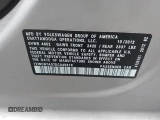 2013 Volkswagen Passat SEL Premium z VIN 1VWCN7A37DC045616, wystawiony jako IAAI lot #42381835 z przebiegiem 130 535 mil mil oraz . Historia ofert i sprzedaży dostępna na DreamBid. Obrazek 9.