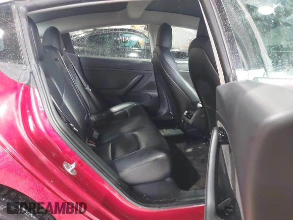 2020 Tesla Model 3 Standard Range Plus z VIN 5YJ3E1EA2LF705670, wystawiony jako IAAI lot #41572352 z przebiegiem 99 980 mil mil oraz . Historia ofert i sprzedaży dostępna na DreamBid. Obrazek 8.