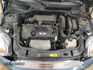 2011 MINI Hardtop with VIN WMWSU3C54BT184251, listed as a Copart auction lot 59298135 with 123,864 mi miles and Salvage title. Bid and sale history available at DreamBid. Image 11.