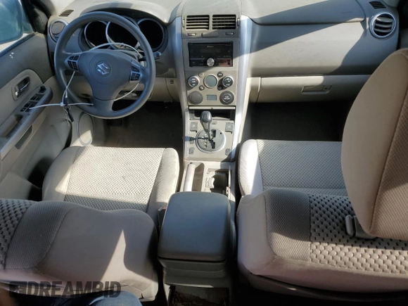 2009 Suzuki Grand Vitara z VIN JS3TD042294100363, wystawiony jako Copart lot #88151185 z przebiegiem 86 595 mil mil oraz Czysty tytuł • Clean title. Historia ofert i sprzedaży dostępna na DreamBid. Obrazek 8.