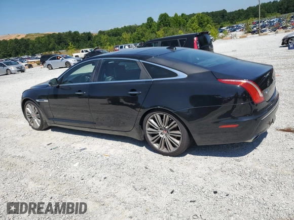 2014 Jaguar XJ Portfolio with VIN SAJWA2GZ2E8V66906, listed as a Copart auction lot 64888135 with 166,194 mi miles and Clean title. Bid and sale history available at DreamBid. Image 2.