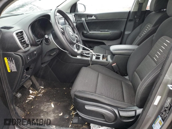 2018 Kia Sportage LX z VIN KNDPMCAC9J7318589, wystawiony jako Copart lot #59397595 z przebiegiem 107 523 mil mil oraz Szkoda całkowita • Salvage title. Historia ofert i sprzedaży dostępna na DreamBid. Obrazek 7.