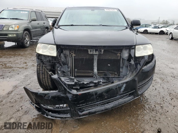2004 Volkswagen Touareg z VIN WVGBC77L54D058303, wystawiony jako Copart lot #47821645 z przebiegiem Nie podano mil oraz Szkoda całkowita • Salvage title. Historia ofert i sprzedaży dostępna na DreamBid. Obrazek 5.