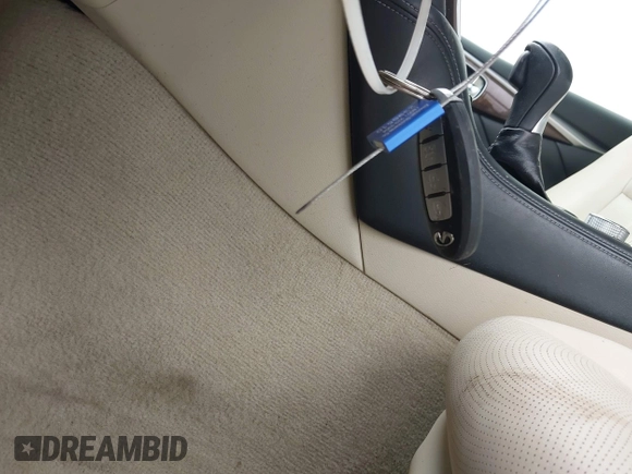 2014 Infiniti Q50 Premium z VIN JN1BV7AP4EM676324, wystawiony jako IAAI lot #42167934 z przebiegiem 114 670 mil mil oraz . Historia ofert i sprzedaży dostępna na DreamBid. Obrazek 11.