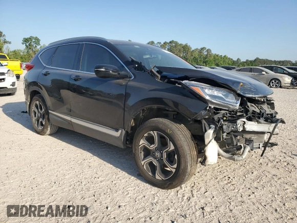 2017 Honda CR-V Touring with VIN 5J6RW1H97HL016344, listed as a Copart auction lot 51812315 with 47,795 mi miles and Salvage Title. Bid and sale history available at carsss.com. Image 4.