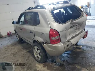 2005 Hyundai Tucson GL with VIN KM8JM12B25U171048, listed as a IAAI auction lot 41634099 with 188,086 mi miles. Bid and sale history available at carsss.com. Image 3.