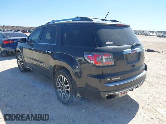 2014 GMC Acadia Denali with VIN 1GKKRTKD1EJ158482, listed as a IAAI auction lot 41826579 with 167,043 mi miles. Bid and sale history available at carsss.com. Image 3.
