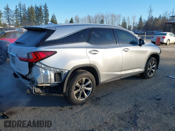 2018 Lexus RX 350L Premium z VIN JTJDZKCAXJ2008164, wystawiony jako IAAI lot #41436168 z przebiegiem 126 798 mil mil oraz . Historia ofert i sprzedaży dostępna na DreamBid. Obrazek 4.