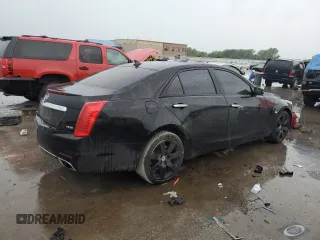 2014 Cadillac CTS Premium AWD with VIN 1G6AZ5S37E0131094, listed as a Copart auction lot 59180975 with 119,592 mi miles and Salvage title. Bid and sale history available at DreamBid. Image 3.