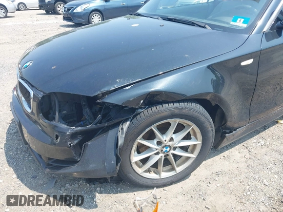 2010 BMW 1 Series 128i with VIN WBAUN1C55AVH81750, listed as a IAAI auction lot 42411484 with 124,432 mi miles and . Bid and sale history available at DreamBid. Image 6.