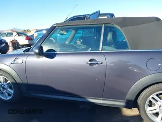 2012 MINI Convertible S with VIN WMWZP3C53CT550336, listed as a IAAI auction lot 40857283 with 51,111 mi miles and . Bid and sale history available at DreamBid. Image 15.