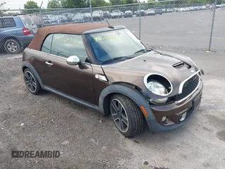 2011 MINI Convertible S with VIN WMWZP3C50BTX84044, listed as a IAAI auction lot 42669717 with Not provided miles and . Bid and sale history available at DreamBid. Image 1.