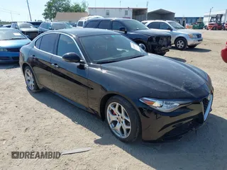 2021 Alfa Romeo Giulia Ti Sport with VIN ZARFAMBN2M7649941, listed as a IAAI auction lot 41912686 with 77,626 mi miles and . Bid and sale history available at DreamBid. Image 1.