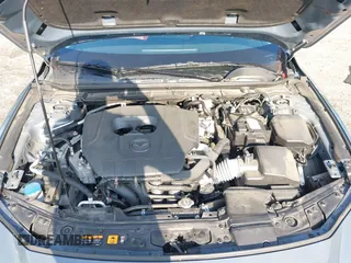 2024 Mazda 3 S Carbon Edition with VIN 3MZBPBCM6RM411828, listed as a IAAI auction lot 42802141 with 40,061 mi miles and . Bid and sale history available at DreamBid. Image 10.