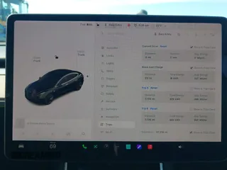 2018 Tesla Model 3 Long Range Battery with VIN 5YJ3E1EA0JF056979, listed as a IAAI auction lot 41865849 with 97,319 mi miles. Bid and sale history available at carsss.com. Image 7.