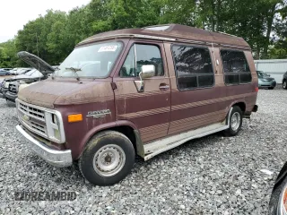 1988 Chevrolet Chevy Van z VIN 1GBEG25K9J7124336, wystawiony jako Copart lot #61481255 z przebiegiem 613 557 mil mil oraz Czysty tytuł • Clean title. Historia ofert i sprzedaży dostępna na DreamBid. Obrazek 1.