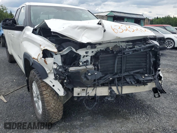 2023 Toyota Tundra SR5 with VIN 5TFLA5GD1PX002017, listed as a Copart auction lot 63232925 with 8,666 mi miles and Salvage title. Bid and sale history available at DreamBid. Image 12.