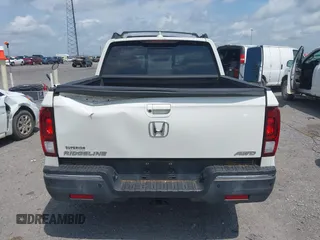 2019 Honda Ridgeline RTL-E with VIN 5FPYK3F77KB021667, listed as a IAAI auction lot 42115019 with 87,221 mi miles and . Bid and sale history available at DreamBid. Image 16.