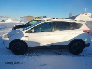 2016 Ford Escape Titanium with VIN 1FMCU9J94GUC81270, listed as a IAAI auction lot 41502724 with 128,161 mi miles. Bid and sale history available at carsss.com. Image 14.