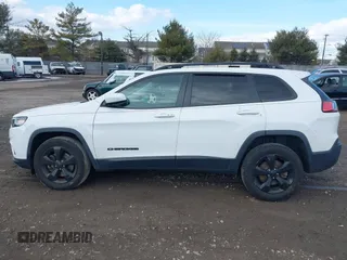 2020 Jeep Cherokee Altitude with VIN 1C4PJMLX0LD621828, listed as a IAAI auction lot 41439862 with 74,350 mi miles and . Bid and sale history available at DreamBid. Image 14.