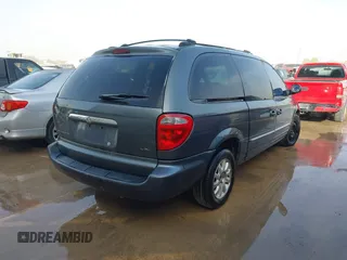 2001 Chrysler Town & Country with VIN 2C4GP54371R356559, listed as a IAAI auction lot 41731368 with 195,903 mi miles and . Bid and sale history available at DreamBid. Image 4.