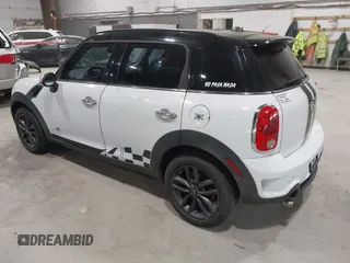 2012 MINI Countryman S with VIN WMWZC5C58CWL60067, listed as a IAAI auction lot 42081725 with 104,397 mi miles and . Bid and sale history available at DreamBid. Image 3.