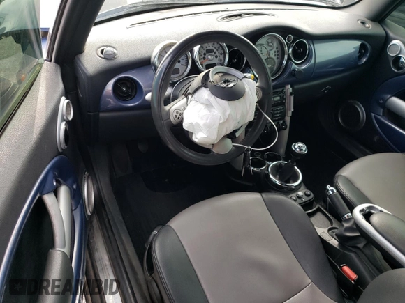 2007 MINI Convertible with VIN WMWRF33537TF66807, listed as a Copart auction lot 43664845 with 91,079 mi miles and Salvage Title. Bid and sale history available at DreamBid. Image 8.