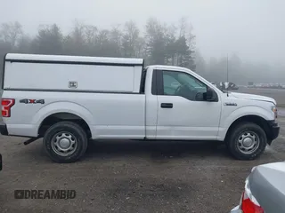 2018 Ford F-150 XL with VIN 1FTMF1EB1JKE19030, listed as a IAAI auction lot 42233745 with 193,352 mi miles and . Bid and sale history available at DreamBid. Image 13.