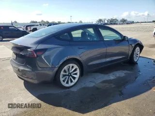 2023 Tesla Model 3 with VIN 5YJ3E1EA7PF456613, listed as a Copart auction lot 56940255 with 35,920 mi miles and Non repairable. Bid and sale history available at DreamBid. Image 3.