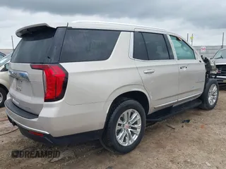 2021 GMC Yukon SLT with VIN 1GKS1BKD4MR121671, listed as a IAAI auction lot 41498510 with 49,109 mi miles. Bid and sale history available at carsss.com. Image 4.