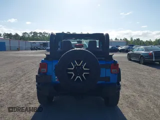 2015 Jeep Wrangler Sport z VIN 1C4AJWAG8FL550859, wystawiony jako IAAI lot #42154946 z przebiegiem 143 658 mil mil oraz . Historia ofert i sprzedaży dostępna na DreamBid. Obrazek 17.