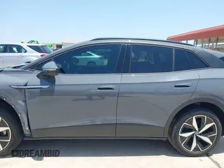 2023 Volkswagen ID.4 Pro S z VIN 1V2GNPE80PC006590, wystawiony jako IAAI lot #42178241 z przebiegiem 17 177 mil mil oraz . Historia ofert i sprzedaży dostępna na DreamBid. Obrazek 15.