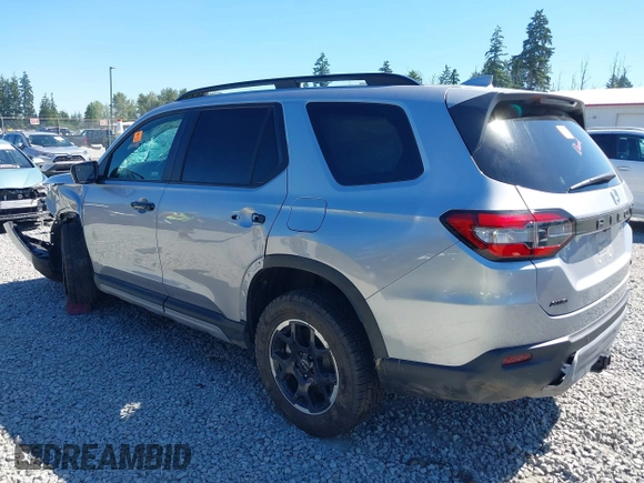 2025 Honda Pilot TrailSport z VIN 5FNYG1H64SB020902, wystawiony jako IAAI lot #42455539 z przebiegiem 11 645 mil mil oraz . Historia ofert i sprzedaży dostępna na DreamBid. Obrazek 3.